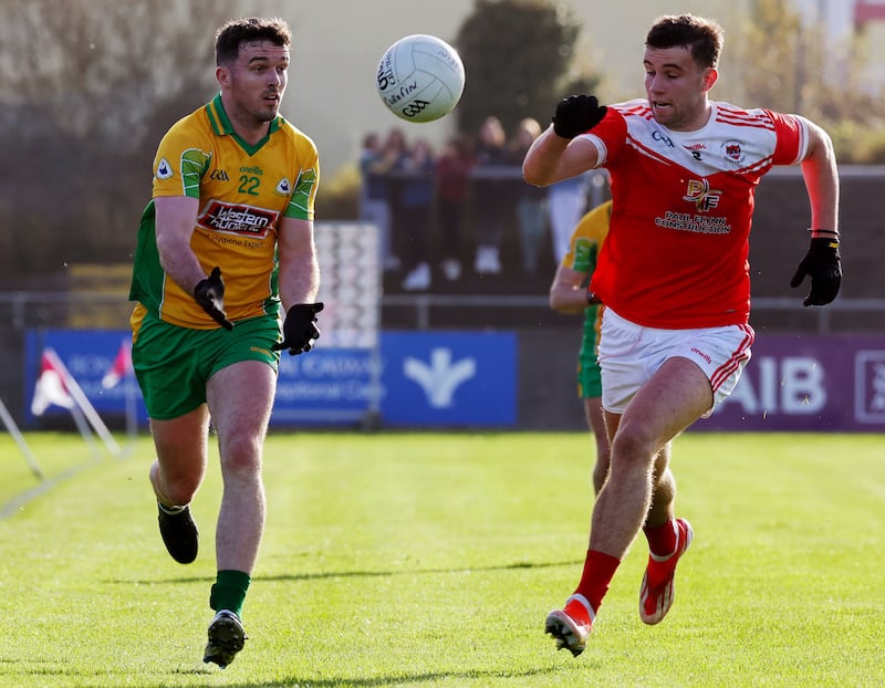 Corofin’s Colin Brady contests possession with Conor Ryan of Pádraig Pearses. Photograph: Lorraine O’Sullivan/Inpho