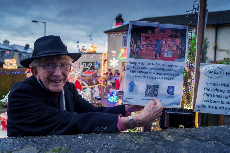 William Tilly at his house on Bath Avenue, Dublin, lit up with Christmas lights for charity yet again this year. Photograph: Barry Cronin 