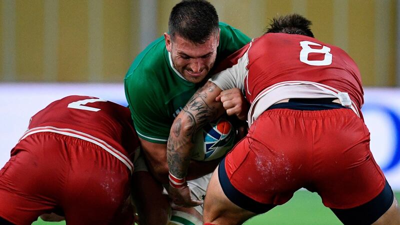 Ireland’s Jean Kleyn is tackled during the win over Russia. Photograph: Getty Images