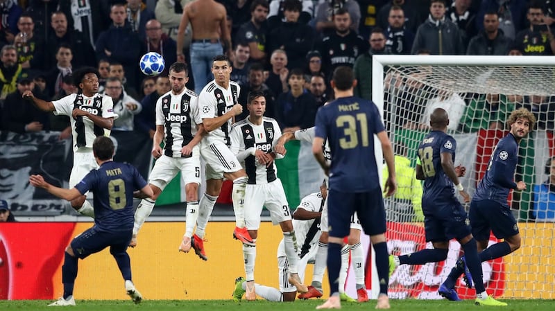 Juan Mata scores a late free-kick to level the game up. Photo: Michael Steele/Getty Images