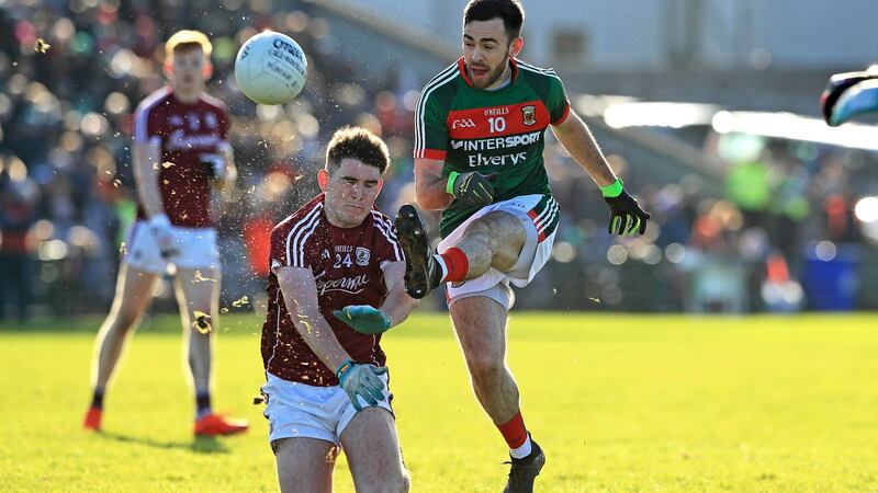 Mayo’s Kevin McLoughlin with Barry McHugh of Galway