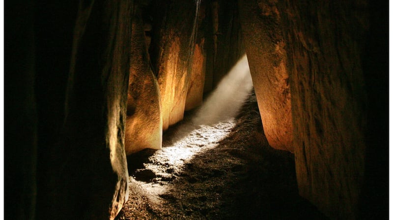 Newgrange passage tomb is famous for its annual solar alignment where the winter solstice sunrise illuminates its sacred inner chamber in a golden blast of light but little is known about who was interred there. Photograph: Alan Betson, Irish Times