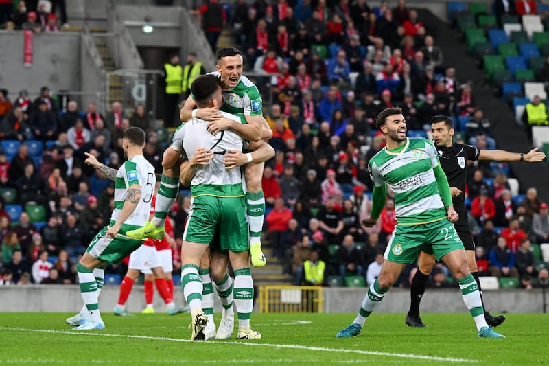 Joshua Honohan is congratulated by team-mates after scoring Shamrock Rovers' opening goal against Larne. Photograph: Charles McQuillan/Getty Images