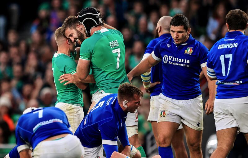 Stuart McCloskey celebrates after scoring a try with Craig Casey and Caelan Doris during the World Cup warm-up win over Italy at the Aviva Stadium. Photograph: Evan Treacy/Inpho