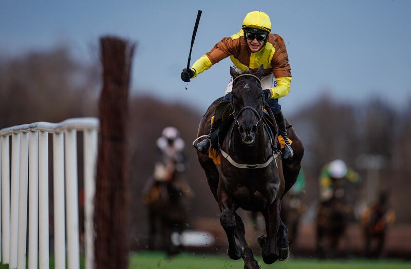 Paul Townend celebrates on Galopin Des Champs as he wins the race. Photograph: James Crombie/Inpho
