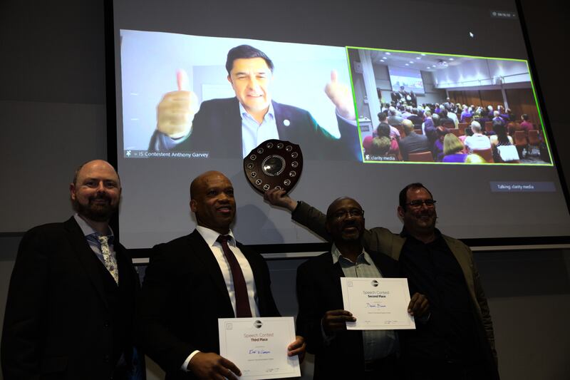 Anthony Garvey won the UK stage of Toastmasters world public speaking competition after competing virtually from Tralee. Below (left-right): contest chair, Chris Boden; third place winner, Errol Williamson; second place winner, Desire Binam; chief judge, Christopher Walker. Photograph: Aegis Photography