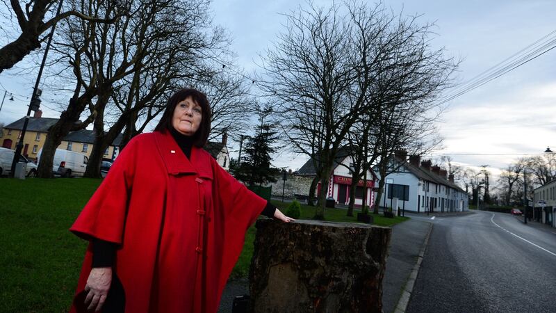 Madge O’Boyle, who is writing a book about her great uncle who was the first RIC officer killed in Easter 1916 in Castlebellingham Co Louth, pictured at the spot where he was killed. Photograph: Dara Mac Dónaill