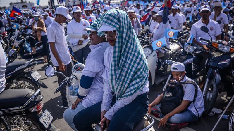 Supporters of the ruling Cambodian People’s Party listen as Prime Minister Hun Sen makes a campaign speech ahead of the commune elections in Phnom Penh in June 2017. Photograph: Lauren Crothers