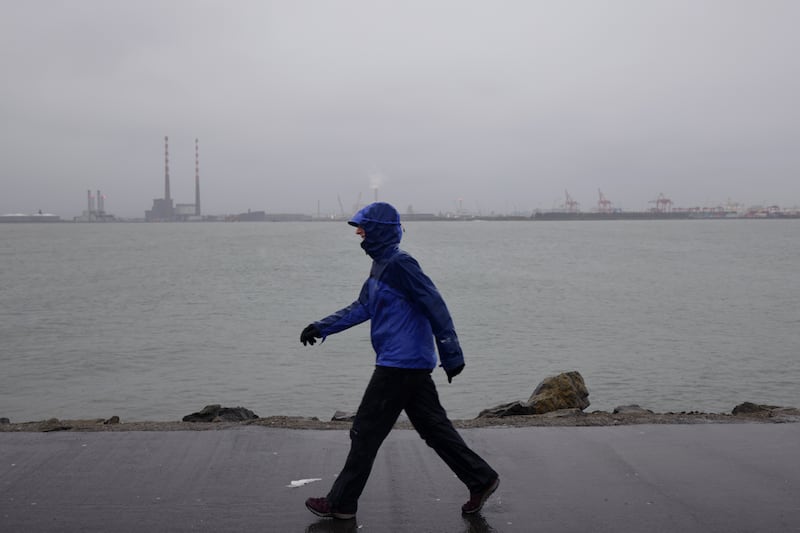 Cold and blustery rain hit Dublin, with  temperatures hovering around 0 degrees today, while many parts of the country got snow. Photograph: Chris Maddaloni/The Irish Times
