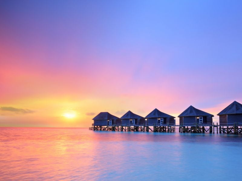 Enjoy the pristine islands of the Maldives, where white sands are lapped by turquoise lagoons