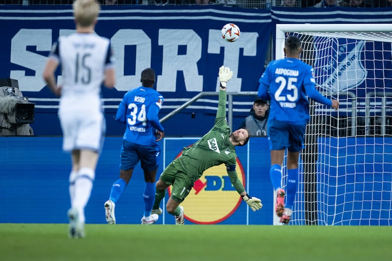 Heung-min Son (not pictured) scores against Hoffenheim goalkeeper Oliver Baumann. Photograph: Simon Hofmann/Getty Images