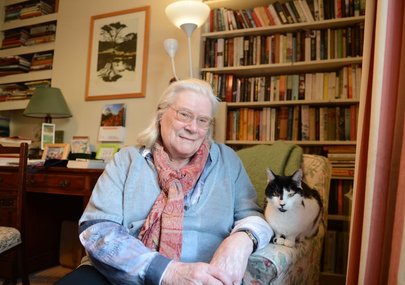 Jennifer Johnston with her cat. Photograph: Alan Betson

