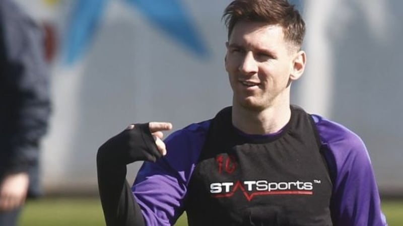 Barcelona star Lionel Messi wearing the Statsports vest in training