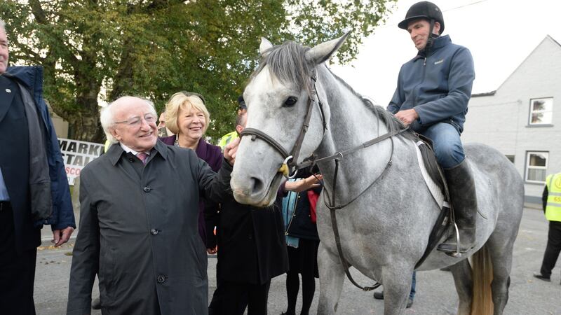 President Michael D Higgins with his wife Sabina and Alan Egan, from Ballinsloe and Cassie, in Co Galway. Photograph: Dara Mac Dónaill