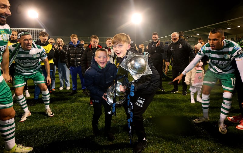 Stephen Bradley’s sons Josh (left) and Jaden lift the trophy after beating Sligo Rovers in the SSE Airtricity League Premier Division, Tallaght Stadium, Dublin, November 2023. Photograph: Ryan Byrne/Inpho