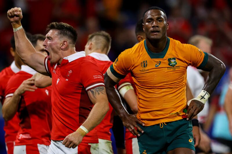 Wales's Josh Adams celebrates as Suli Vunivalu reflects one an embarrassing defeat for Australia. Photograph: James Crombie/Inpho