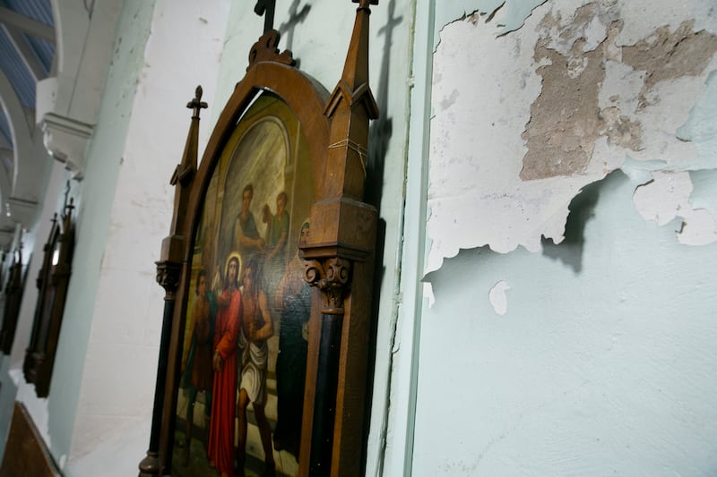 Paint and plaster peeling from the interior of the Church of the Immaculate Heart of Mary. Photograph: Gareth Chaney/ Collins 