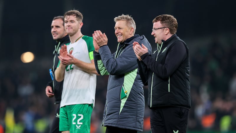 Ireland head coach Heimir Hallgrímsson and Nathan Collins celebrate the victory. Collins had a hugely influential game for his side. Photograph: Ryan Byrne/Inpho 