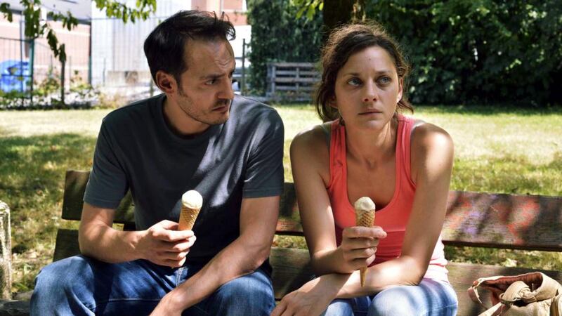 Fabrizio Rongione and Marion Cotillard in Two Days, One Night