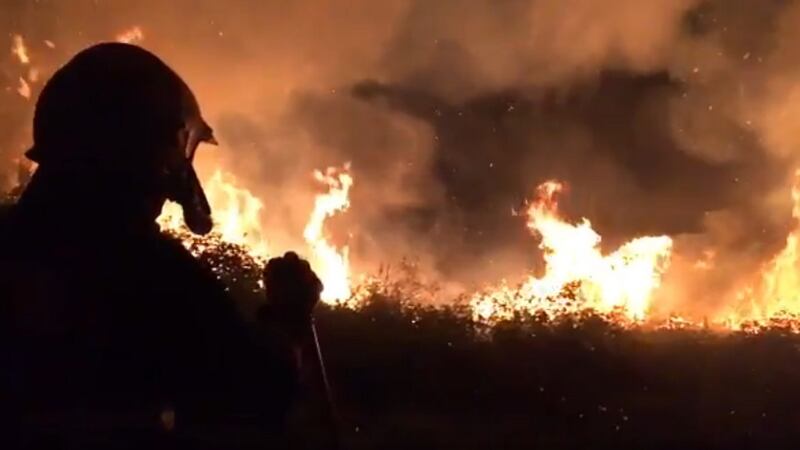 Bantry Fire Brigade crew dealing with gorse fire near Aughaville on Tuesday