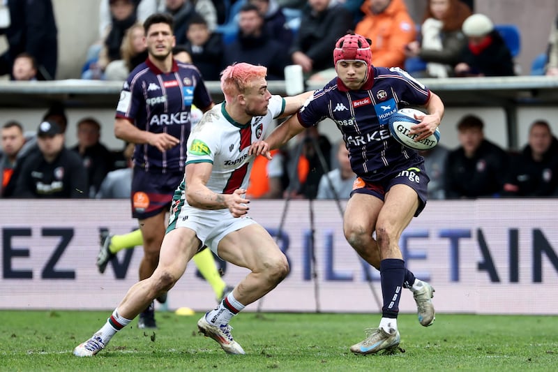 Leicester' British wing Ollie Hassell Collins (left) tackles Bordeaux's flying French fullback Louis Bielle Biarrey during last week's Champions Cup encounter which the French club won 42-28. Photograph: Romain Perrocheau/AFP via Getty Images