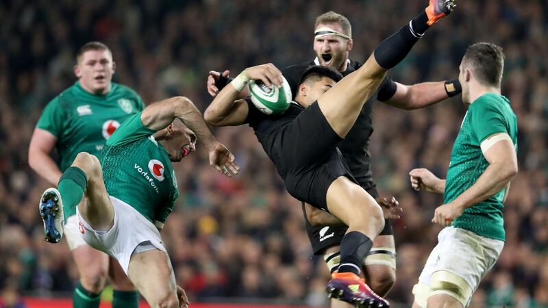 Ireland’s Rob Kearney collides with with Rieko Ioane of New Zealand while going for a high ball. Photograph: Dan Sherida/Inpho