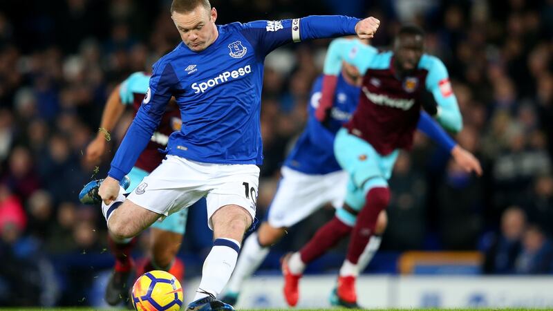 Wayne Rooney’s halfway line goal against West Ham. Photograph: Getty Images