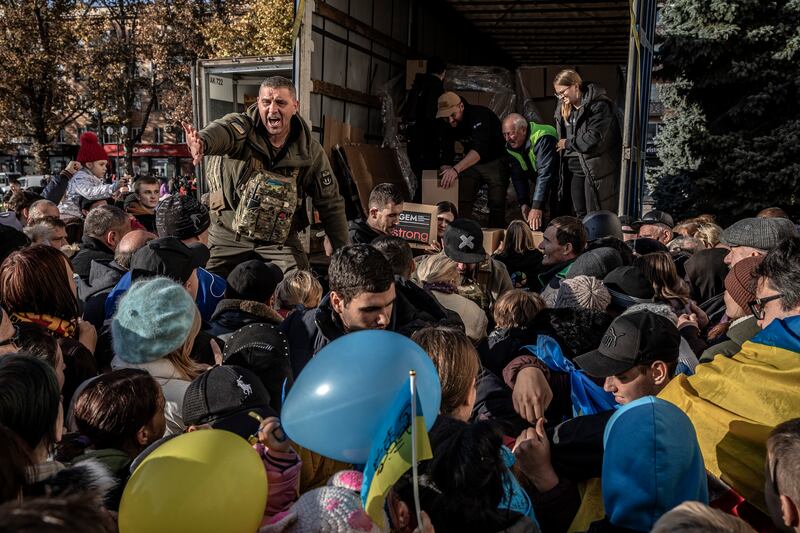 Food is distributed from a truck in Kherson on Tuesday. Photograph: Finbarr O’Reilly/New York Times