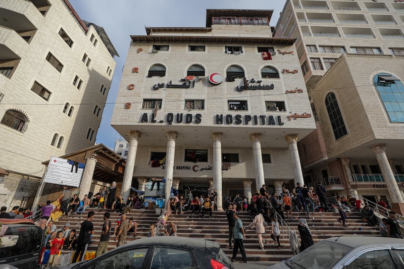 Palestinian people who fled their homes gathering at the Al-Quds hospital in the Tel al-Hawa neighborhood in Gaza City. Photograph: Mohammed Saber/EPA