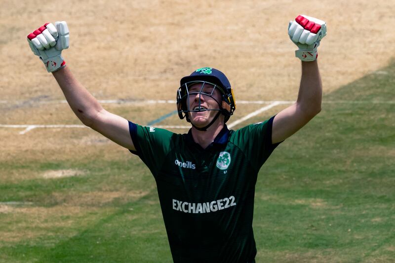 Harry Tector celebrates reaching his century,. Photograph: Jekesai Njikizna / AFP via Getty Images