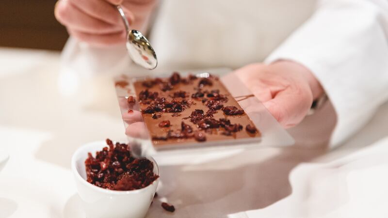 Making a Lindt Excellence dark chocolate bar with cranberries. Photograph: Ondrej Kolacek