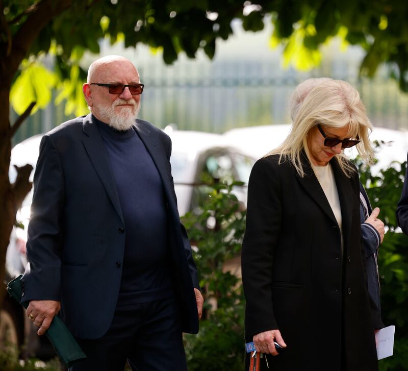 The Chieftains' Matt Molloy and wife Eileen at the funeral of Seán Keane in Saggart. Photograph: Arthur Carron/Collins