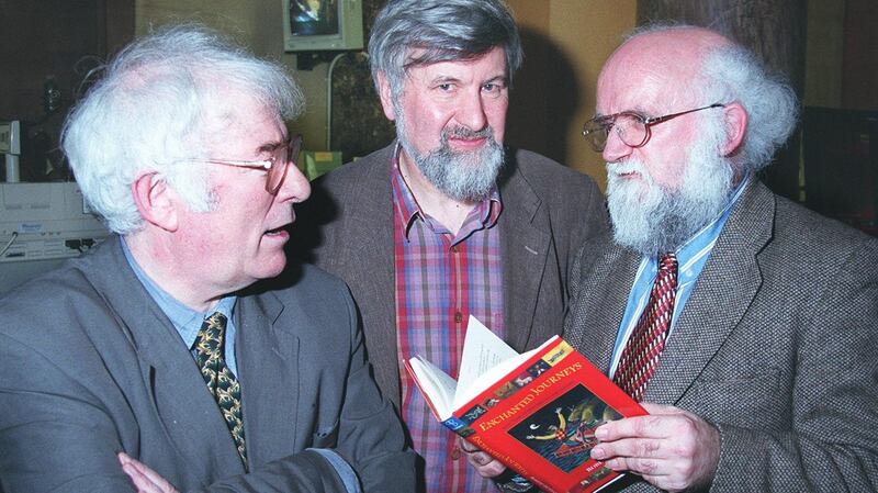 Robert Dunbar, right, at the launch of  Enchanted Journeys, an anthology he edited,  in the National Museum of Ireland with Seamus Heaney and publisher Michael O’Brien. Photograph: Joey Cleary