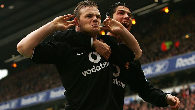 Wayne Rooney celebrates a goal at Anfield in 2005 with Cristiano Ronaldo. Photograph: Bryn Lennon/Getty