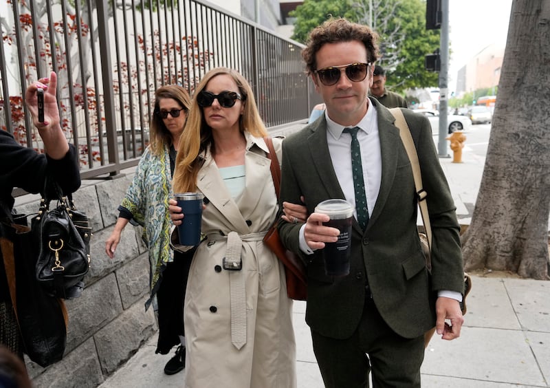 Danny Masterson, right, and his wife Bijou Phillips arrive for closing arguments in his second trial in Los Angeles. Photograph: Chris Pizzello/AP/PA