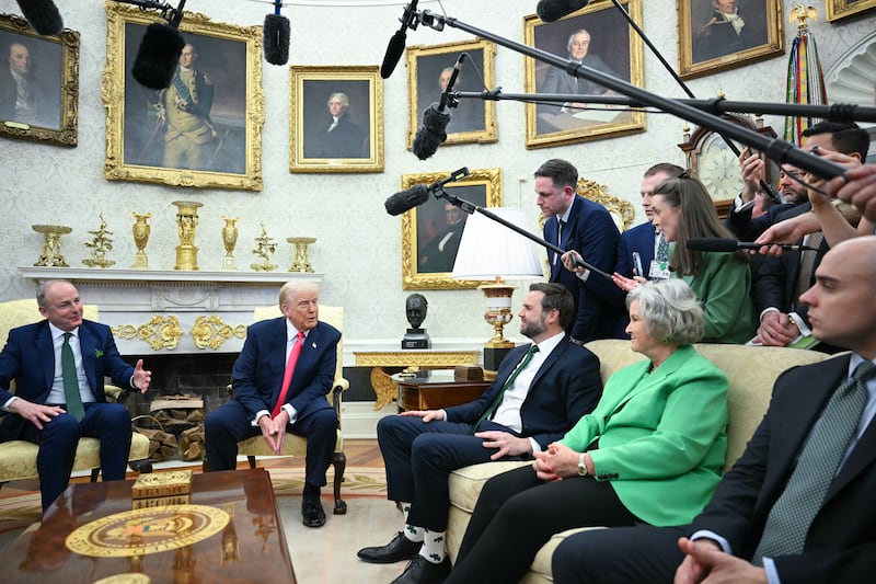 When asked who Mr Trump's favourite Irish person is, he references our 'great fighter' and reporters shout the name Conor McGregor. Mr Trump compliments his tattoos and says 'he is great right?' Photograph: Mandel Ngan/AFP        