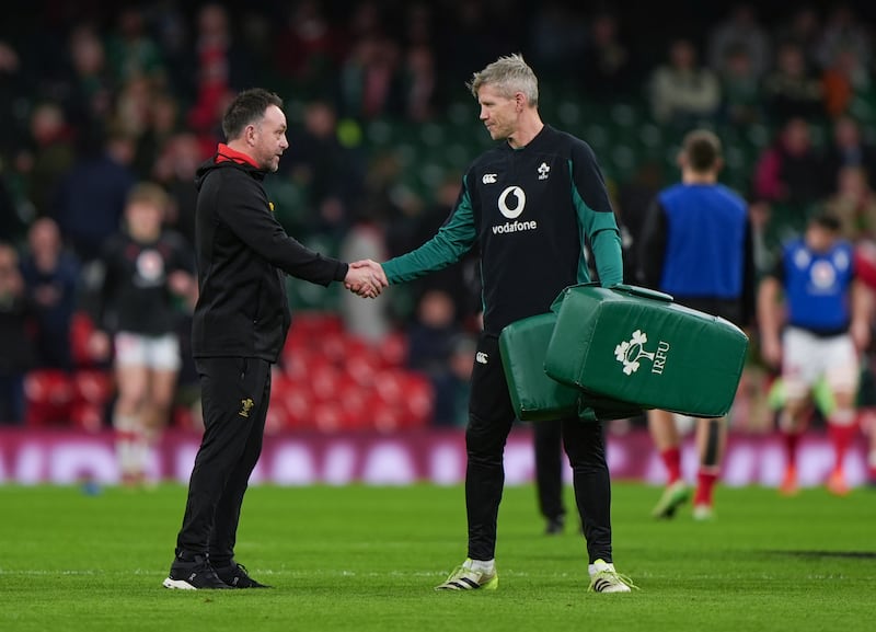 Wales interim head coach Matt Sherratt and Ireland interim head coach Simon Easterby shake hands before the Guinness Men's Six Nations match at the Principality Stadium. Photograph: Joe Giddens/PA Wire.

