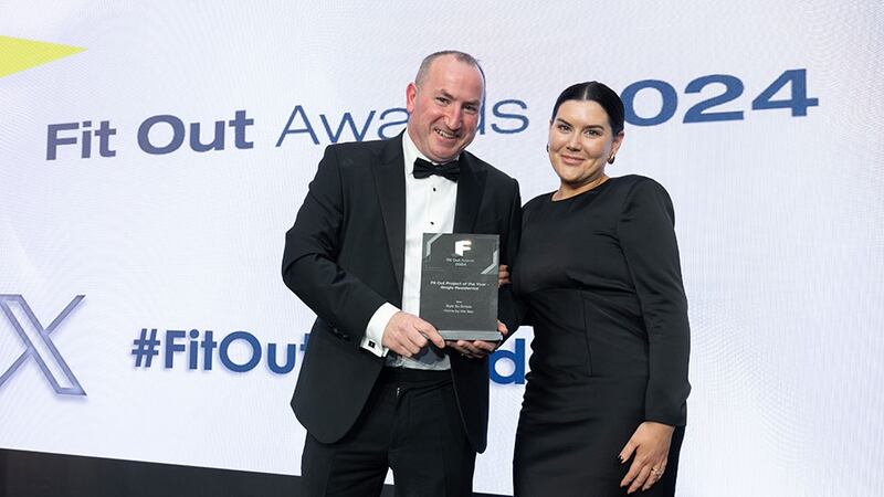 John Flannery, managing director of Havwoods, presents the fit out project of the year - single residential award to Aoife Tobin, Style So Simple