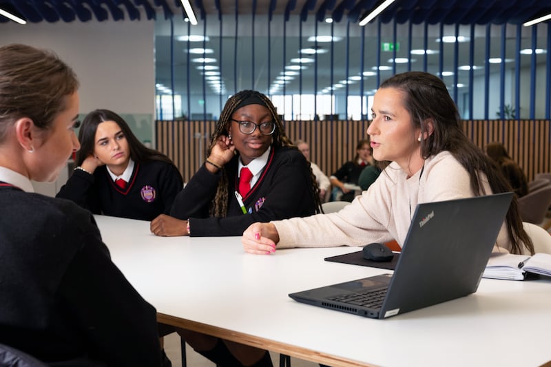 Sun Life's Phil Healy mentors secondary school students on the Stem Passport for Inclusion programme at the Sun Life offices in Waterford