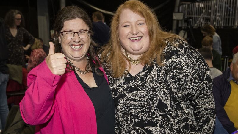 Alliance Party candidate Kellie Armstrong (left) celebrates with her party leader Naomi Long at the Titanic Exhibition Centre in Belfast. Photograph:  Liam McBurney/PA Wire