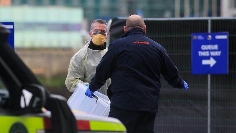 Healthcare workers at the testing area for Covid-19  at Sir John Rogerson’s Quay, Dublin. Photograph: Gareth Chaney/Collins