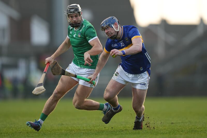 Alan Tynan of Tipperary in action against Limerick's Barry Murphy at the TUS Gaelic Grounds. Photograph: James Lawlor/Inpho