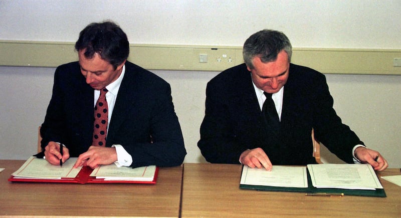 Tony Blair (left), the British prime minister, and then taoiseach Bertie Ahern sign the Belfast Agreement on April 10th, 1998. Photograph: PA