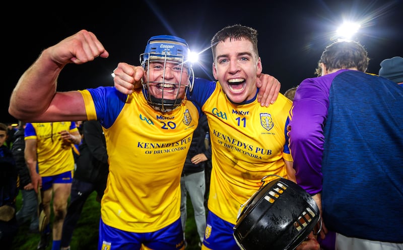 Na Fianna’s Diarmuid Clerkin and Donal Burke celebrate after the game. Photograph: Ryan Byrne/Inpho