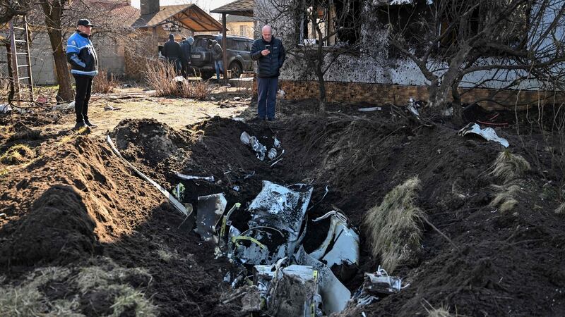 The remains of a missile in the yard of a house hit by shelling in the Osokorky district of southeastern Kyiv, Ukraine, on Tuesday. Photograph: Genya Savilov/AFP/Getty