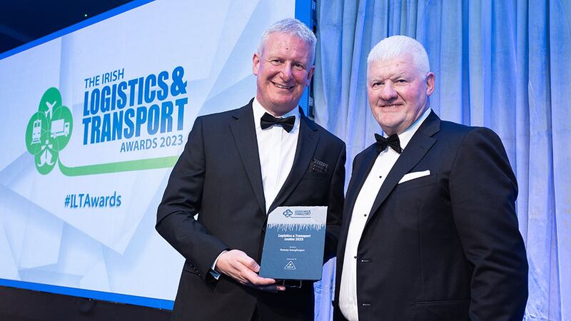 Lee Hazzard, Santry Office Manager, ISM, presents the Logistics & Transport Leader 2023 award to Danny Geoghegan, Primeline Group.