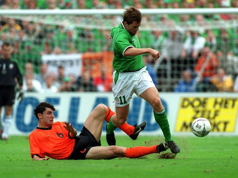 Ireland's Kevin Kilbane and Mark Van Bommel of the Netherlands during a World Cup 2002 qualifier at Lansdowne Road, Dublin, in September 2001. Photograph: Lorraine O'Sullivan/Inpho