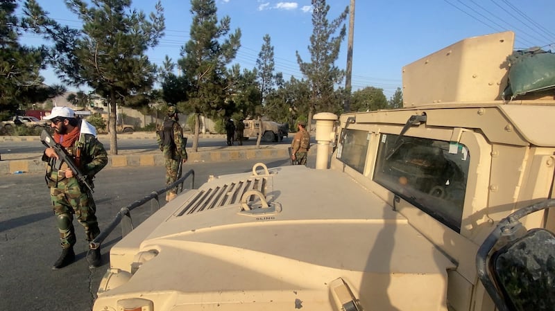 Taliban patrols outside Hamid Karzai International Airport in Kabul, Afghanistan. Photograph: EPA/STRINGER