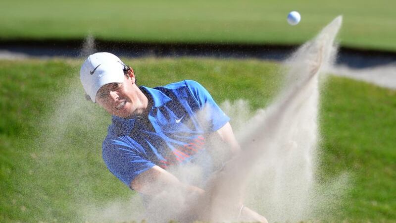 McIlroy hits out of a bunker on the way to his Australia Open success. Photograph: Inpho Rory McIlroy  hits out of a bunker on the way to winning the Australian OpenPhotograph: Getty Images