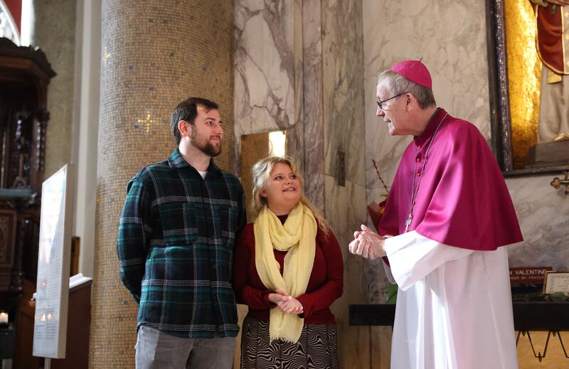 Bishop Denis Nulty blesses engaged couple Siobhan O’Shaughnessy and Kieran Davey at St Valentine’s Shrine in Our Lady of Mount Carmel Church, Whitefriar Street, Dublin. Photograph: Dara Mac Dónaill